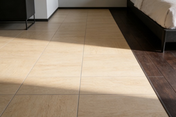 underfloor heating system being installed under porcelain tiles