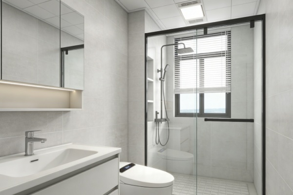 A shower niche with decorative patterned tiles surrounded by solid light-colored tiles.