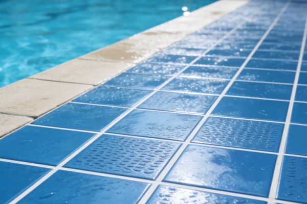 A person easily cutting a ceramic tile for a DIY project