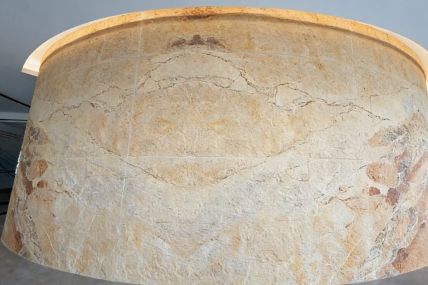 Durable exterior faux stone cladding