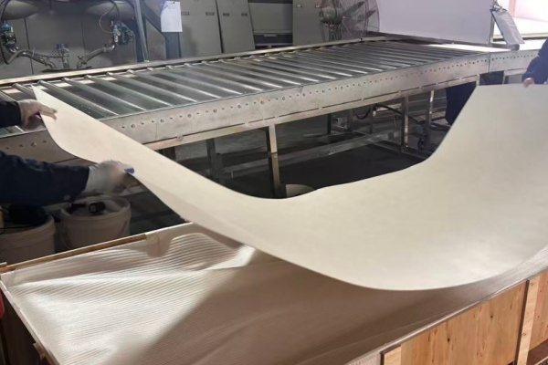 Flexible stone being bent by hand